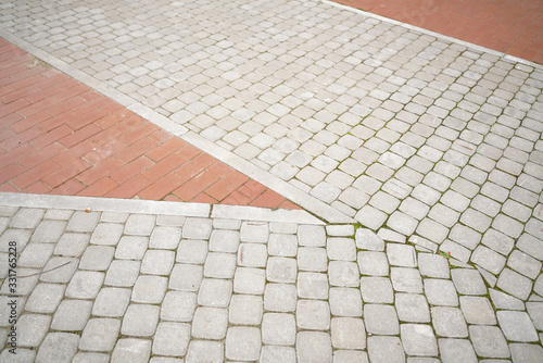 stone pavement in perspective with nobody. old streets.