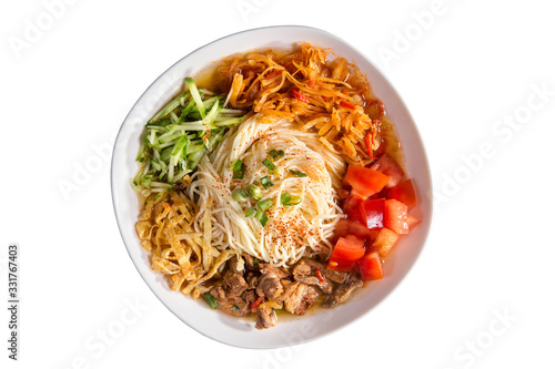 Lagman. Noodles with veal, tomatoes, cucumbers and other spices in the broth.