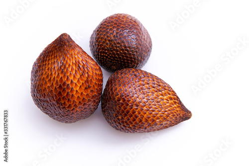 salak or thorny palm isolated from a white background and copy space, scientific name: Salacca zalacca