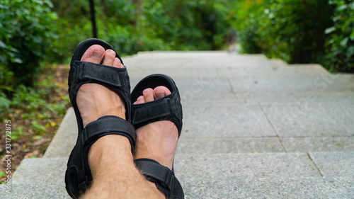 resting tourist on the steps