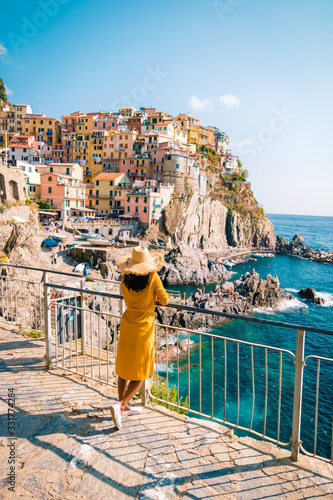 Fotografie, Obraz woman visit Manarola Village, Cinque Terre Coast Italy