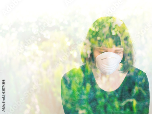 Young woman with face mask during Coronavirus pandemic staying home but missing nature and walks outdoors. Environment pollution concept. Double exposure portrait. photo