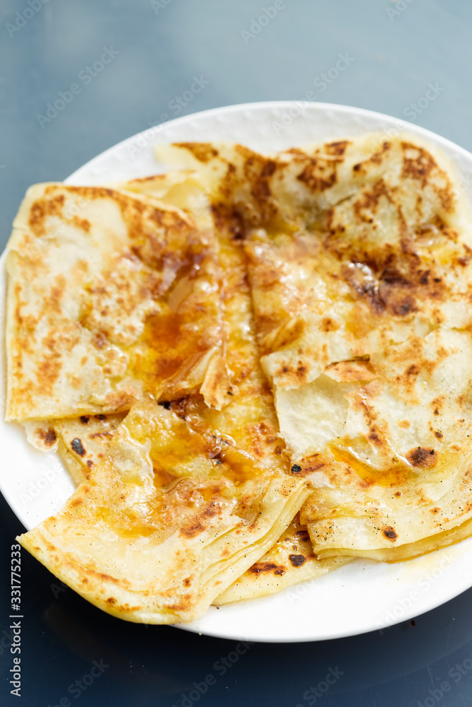 Sweet msemen - Moroccan pancakes with honey 