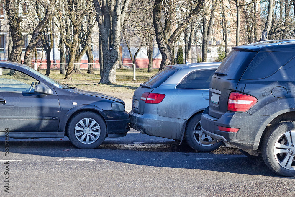 street lighting. City street, several cars were crashed into an accident if the distance was not respected street lighting. City street, several cars were crashed into an accident if the distance was not respected