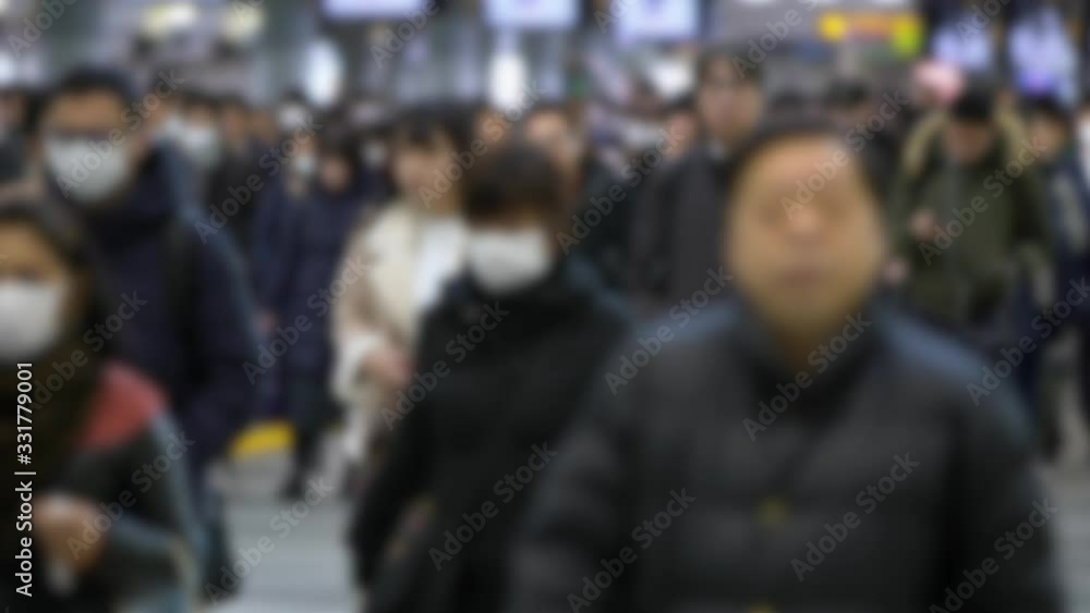 4K, Blurred defocused view of Large crowd people wearing surgical mask walking in subway exit. Coronavirus pneumonia has been spreading into many cities. 2019-nCoV epidemic of China.-Dan 4K, Blurred defocused view of Large crowd people wearing surgical mask walking in subway exit. Coronavirus pneumonia has been spreading into many cities. 2019-nCoV epidemic of China.-Dan
