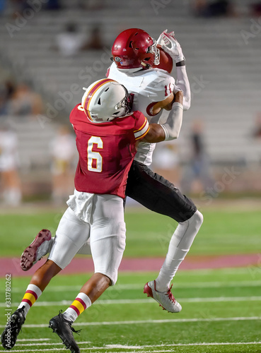 Great action photos of football players making amazing plays during a football game