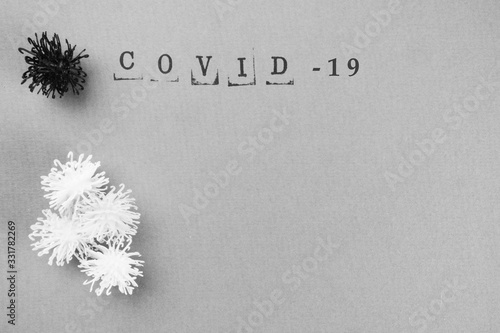 Covid 19 coronavirus text in monochrome background
