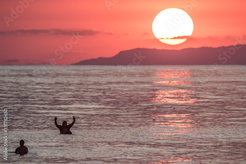surfing sunset Jaco beach costa rica