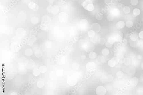 silver and white bokeh lights defocused. abstract background