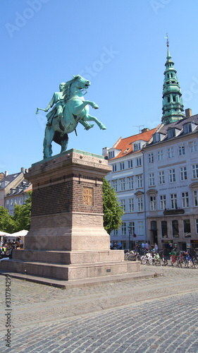 COPENHAGEN, DENMARK - JUL 06th, 2015: Bishop Absalon statue in Hojbro Plads in Copenhagen photo