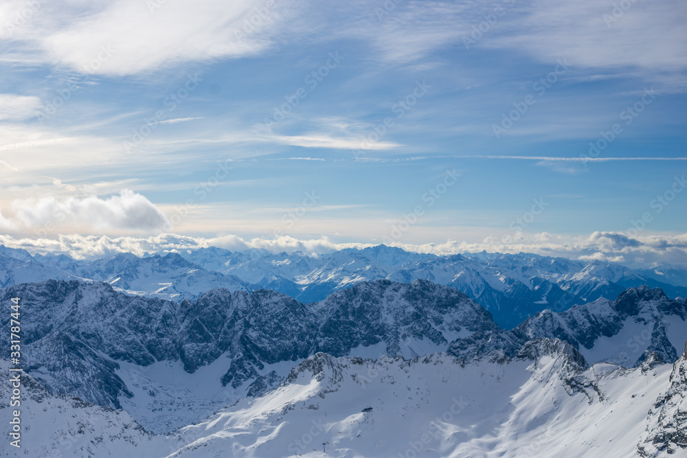 High alpine mountains with snow in Germany and blue beautiful sky High alpine mountains with snow in Germany and blue beautiful sky