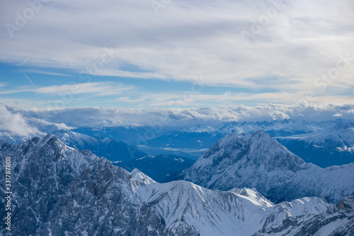 High alpine mountains with snow in Germany and blue beautiful sky