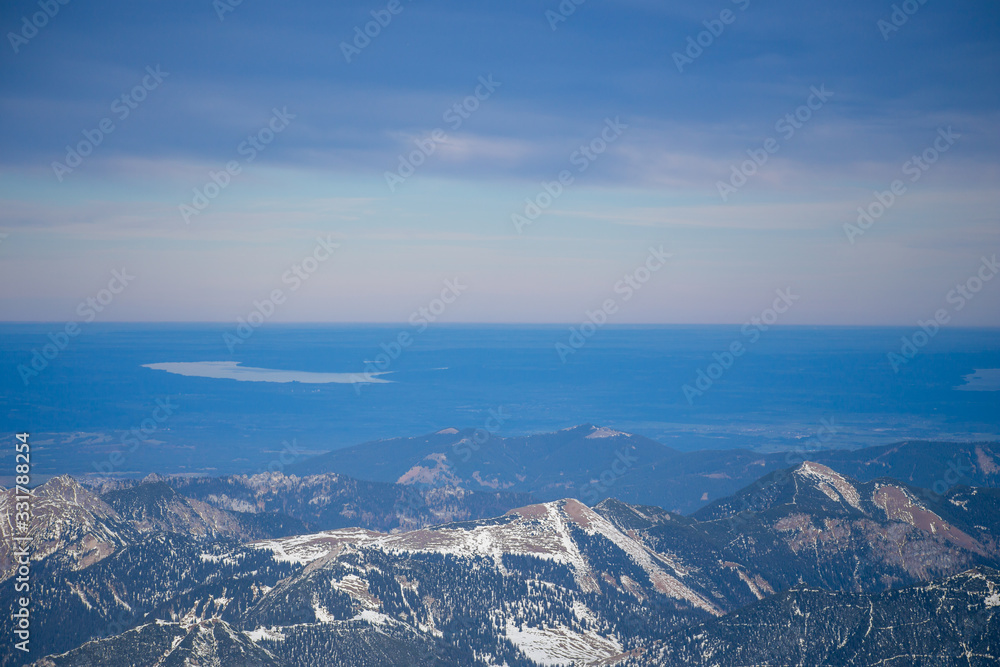 High alpine mountains with snow in Germany and blue beautiful sky