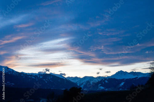 High alpine mountains with snow in Germany and blue beautiful sky