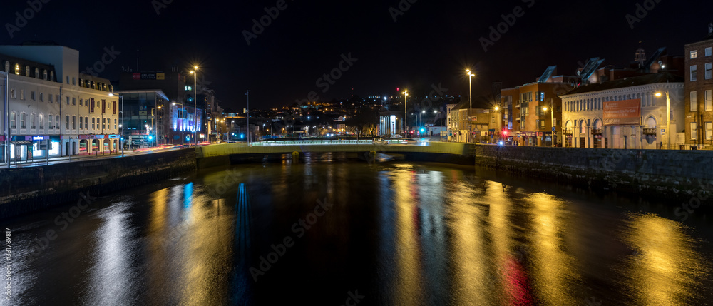 Beautiful night view scene Cork city center old town Ireland cityscape reflection river Lee