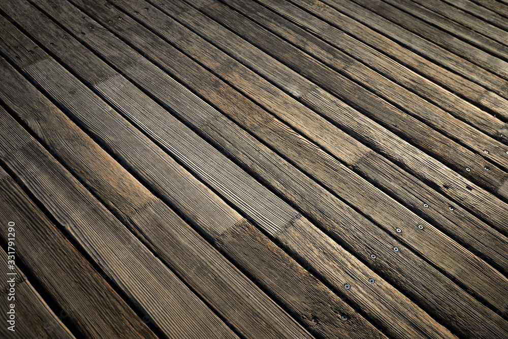 Wooden texture. Old terrace board. Background of old natural wooden dark empty deck with messy and grungy crack beech, oak tree floor texture inside vintage, retro perfect blank. Wooden texture. Old terrace board. Background of old natural wooden dark empty deck with messy and grungy crack beech, oak tree floor texture inside vintage, retro perfect blank.