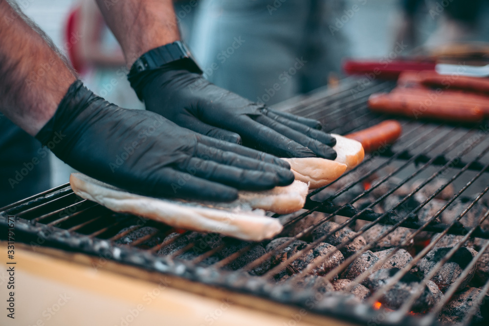 Delicious fresh hot dogs on the grill Delicious fresh hot dogs on the grill