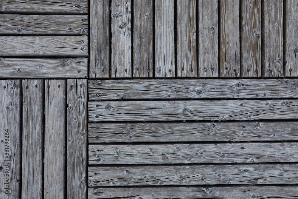 Wooden texture. Old terrace board. Background of old natural wooden dark empty deck with messy and grungy crack beech, oak tree floor texture inside vintage, retro perfect blank. Wooden texture. Old terrace board. Background of old natural wooden dark empty deck with messy and grungy crack beech, oak tree floor texture inside vintage, retro perfect blank.