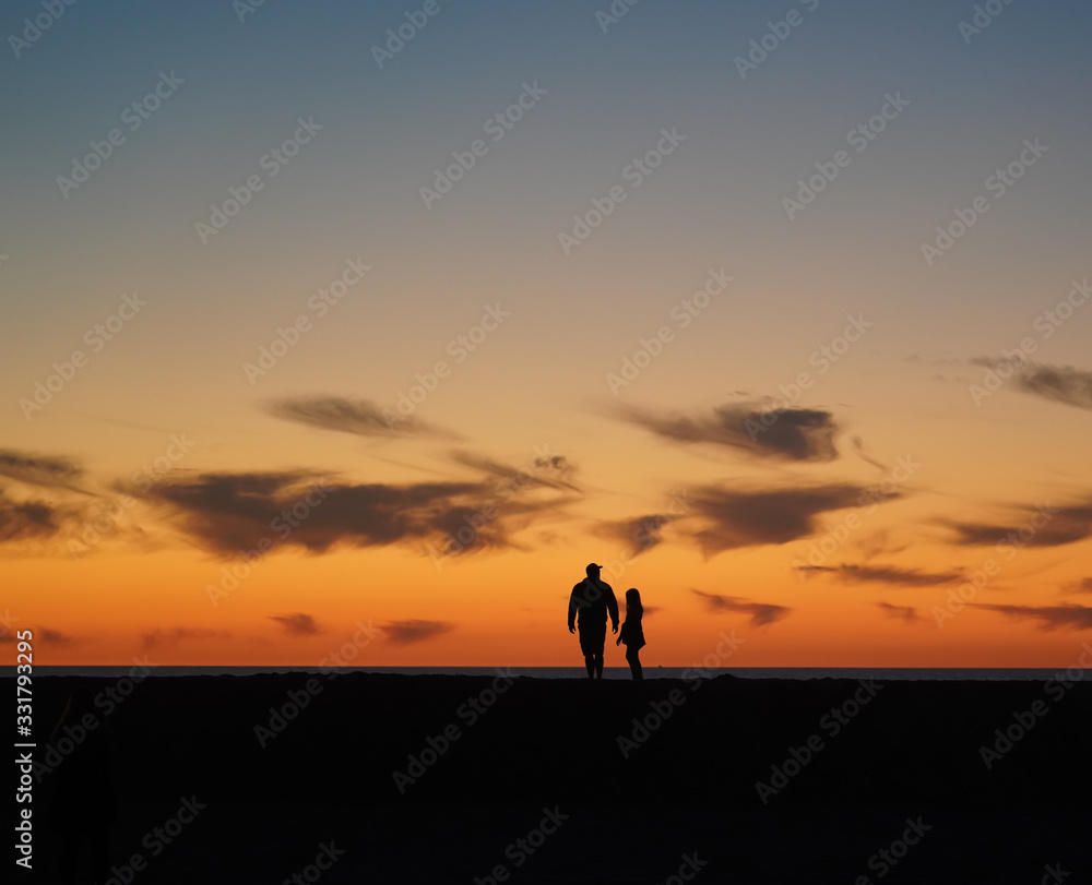 Silhouette Sunset with Father Daughter
