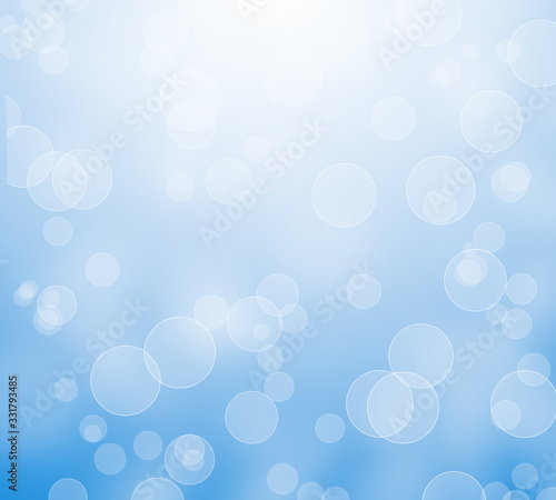 Abstract bokeh blue color background. Christmas bokeh lights refocused blurred background