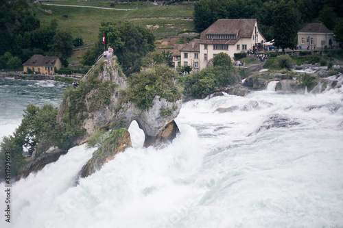 View of a waterfall in the old European city of Schaffhausen