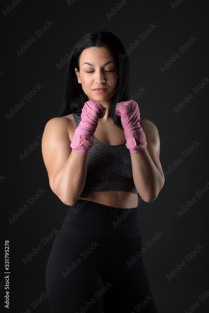 Woman boxer training hard. Woman boxer training hard.