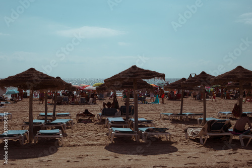 A bunch of umbrellas on the beach in murcia in spain