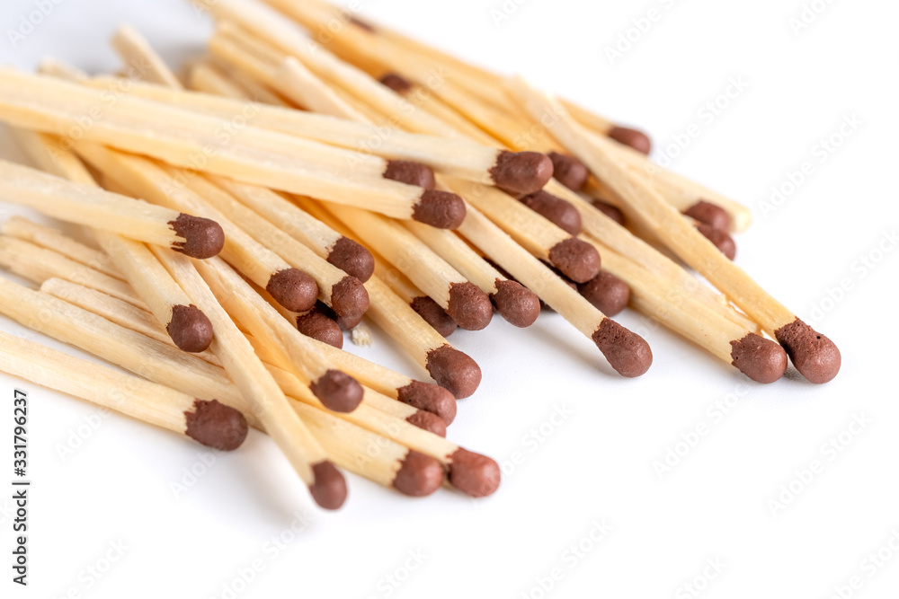 Wooden matches with sulfur for lighting a fire isolated on a white background