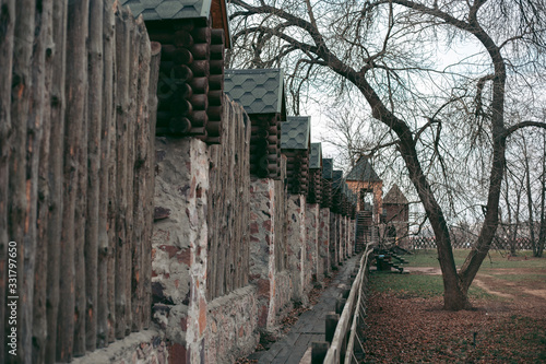 Old medieval wooden fortress with towers