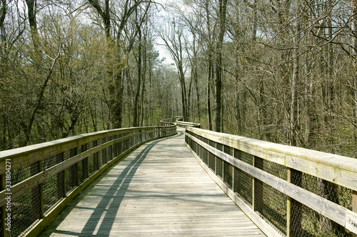 A greenway trail curving through the trees in Raleigh, North Carolina © PT Hamilton