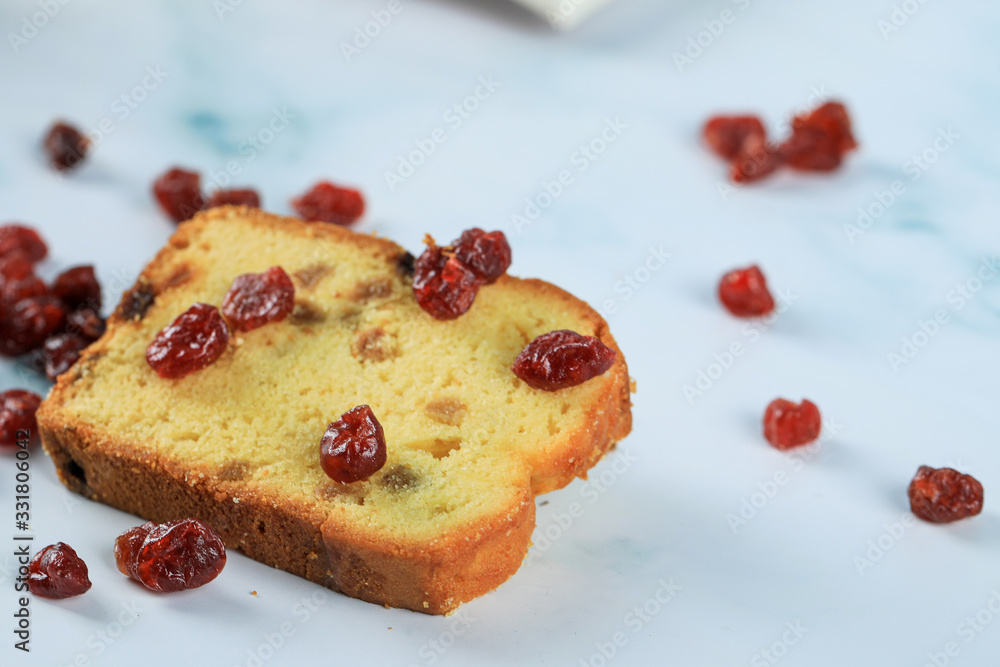 Red berries on and over a slice of toast Red berries on and over a slice of toast