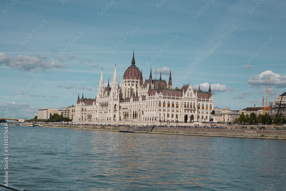 Fototapeta premium Budapest Parliament Building in the afternoon against a clear blue sky