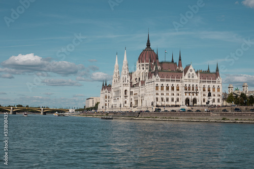 Budapest Parliament Building in the afternoon against a clear blue sky © Hennadii