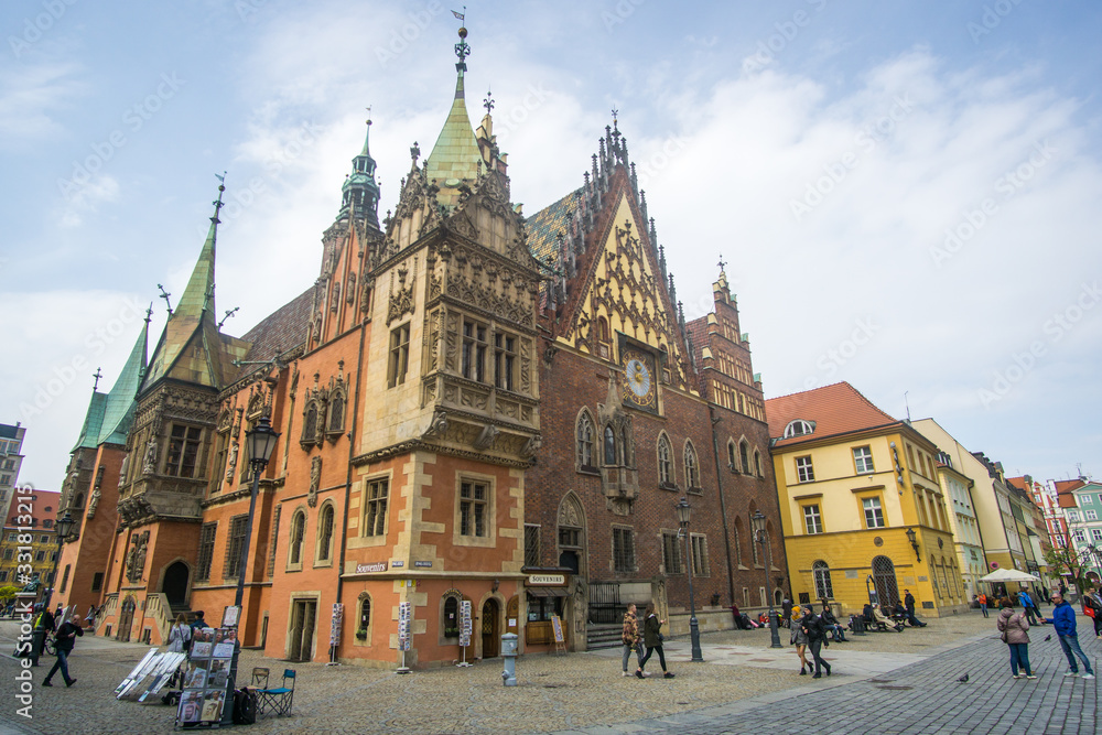 The Market Square in the city center of Wrocław city in Poland. in the picture you see the old colorful buildings and the Old town hall building