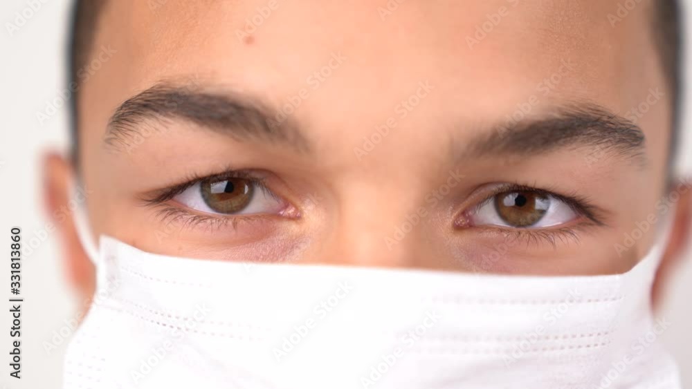 A young boy put on mask to ptoroect from Corona virus. Covid19. Qurantina. A young boy put on mask to ptoroect from Corona virus. Covid19. Qurantina.