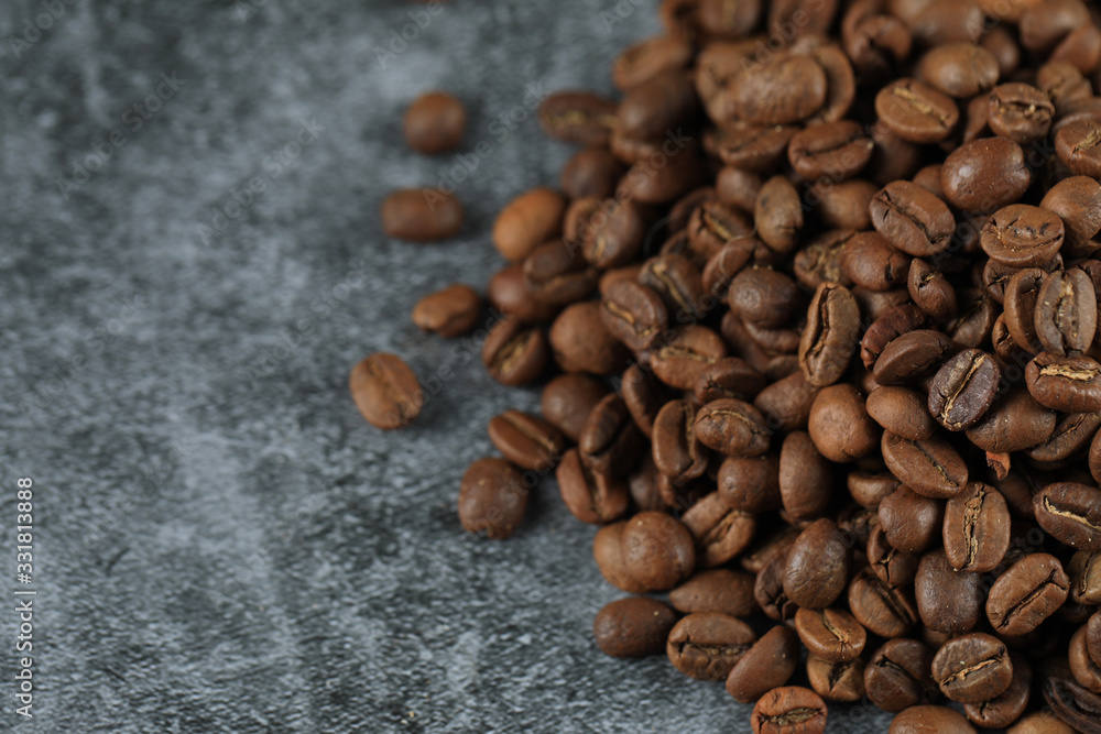 Fresh coffee beans for wholesale, on the right side of the background Fresh coffee beans for wholesale, on the right side of the background