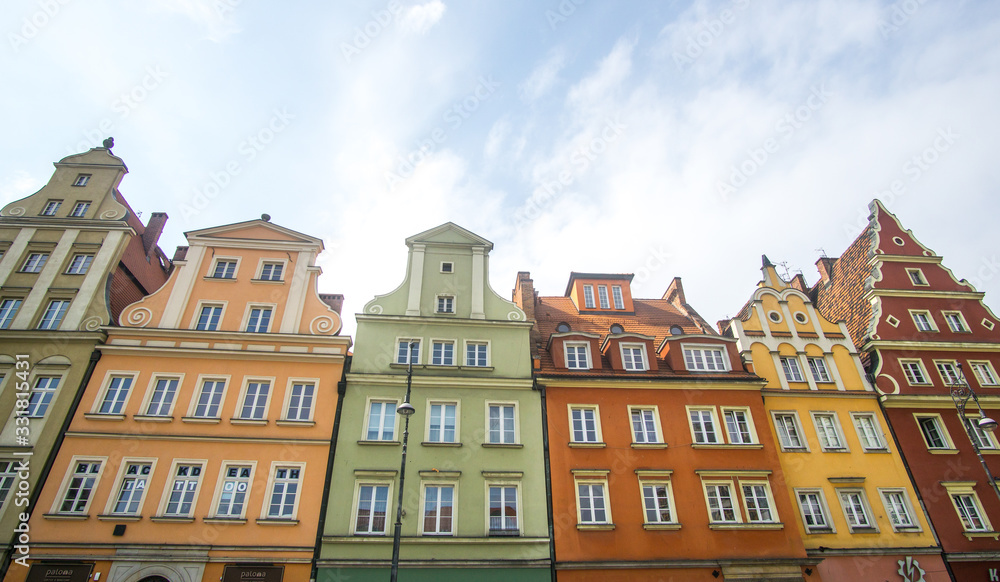 The Market Square in the city center of Wrocław city in Poland. in the picture you see the old colorful buildings and the Old town hall building