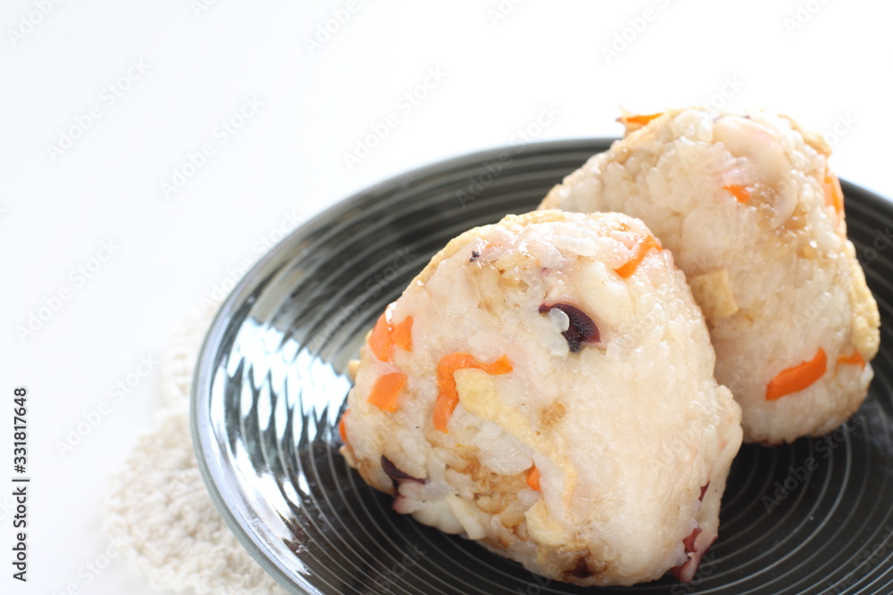 Japanese food, chicken and carrot rice ball on dish