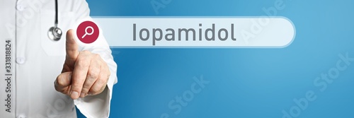 Iopamidol. Doctor in smock points with his finger to a search box. The word Iopamidol is in focus. Symbol for illness, health, medicine photo