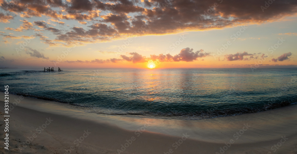 Panorama of a Beautiful Golden Sunrise by the Beach Background Panorama of a Beautiful Golden Sunrise by the Beach Background