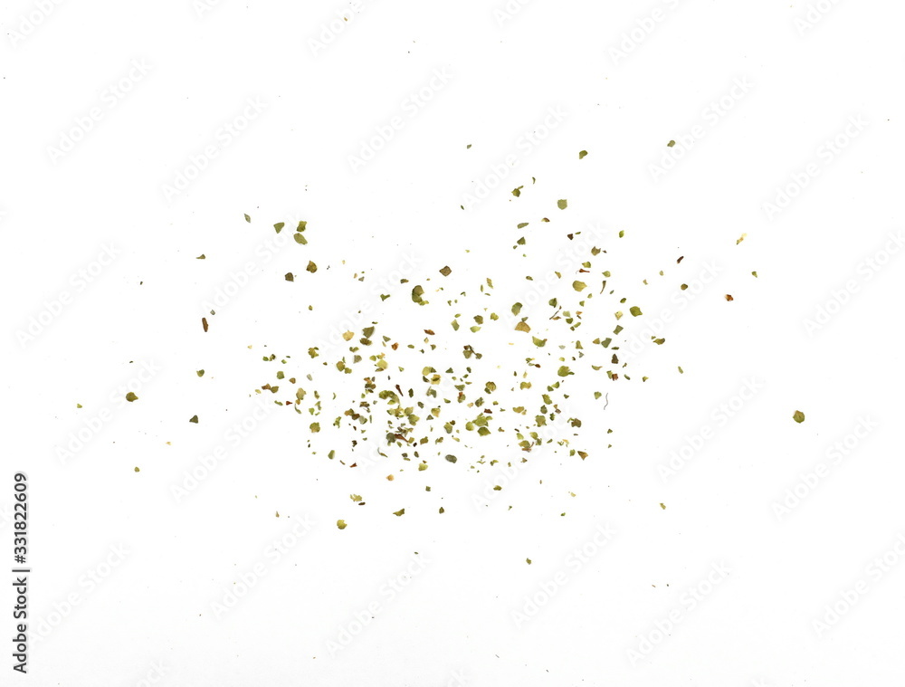 Pile of dried oregano isolated on white. Pile of dried oregano leaves on a white background. Spice for pizza. Pizza ingredient. Pile of dried oregano isolated on white. Pile of dried oregano leaves on a white background. Spice for pizza. Pizza ingredient.