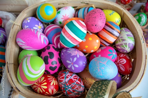 Easter background with Easter eggs. Easter eggs in a basket.
