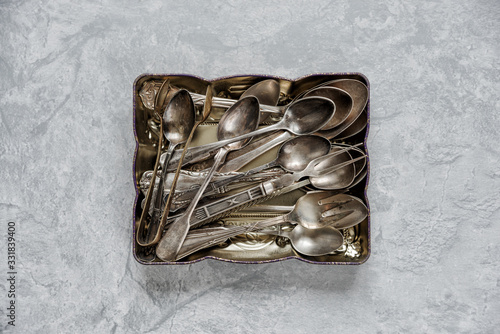Canvas Print Silver flatware in a metal tray