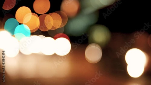 Car headlight lights in the city