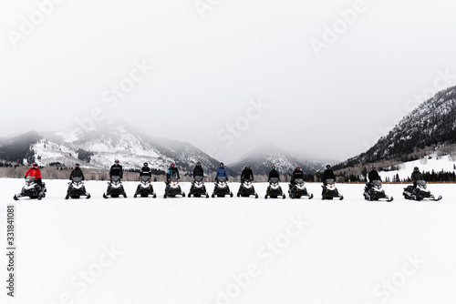 Group of snowmobilers in the backcountry