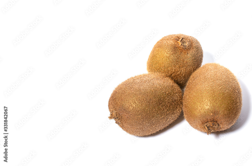 Kiwi fruit with pieces isolated on a white background, close -up. Kiwi fruit with pieces isolated on a white background, close -up.