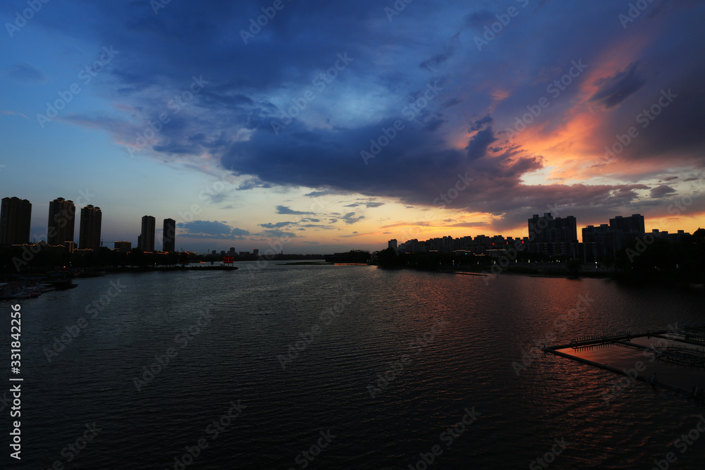 The evening scenery of waterfront city