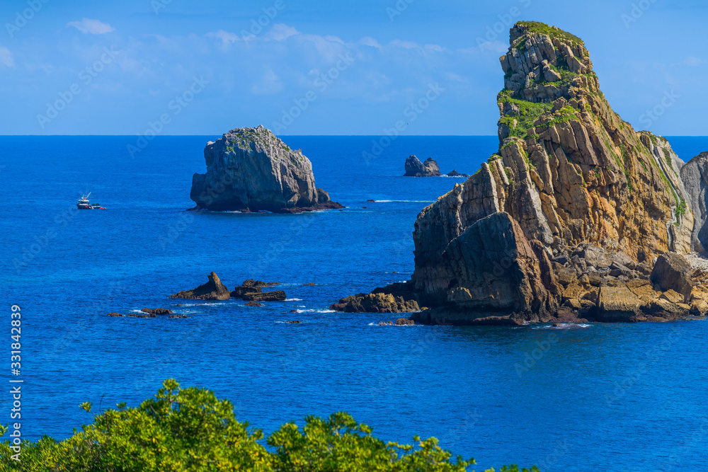 Obraz premium Incredible cliffs on the coast near the village of Liencres. Cantabria. Northern coast of Spain