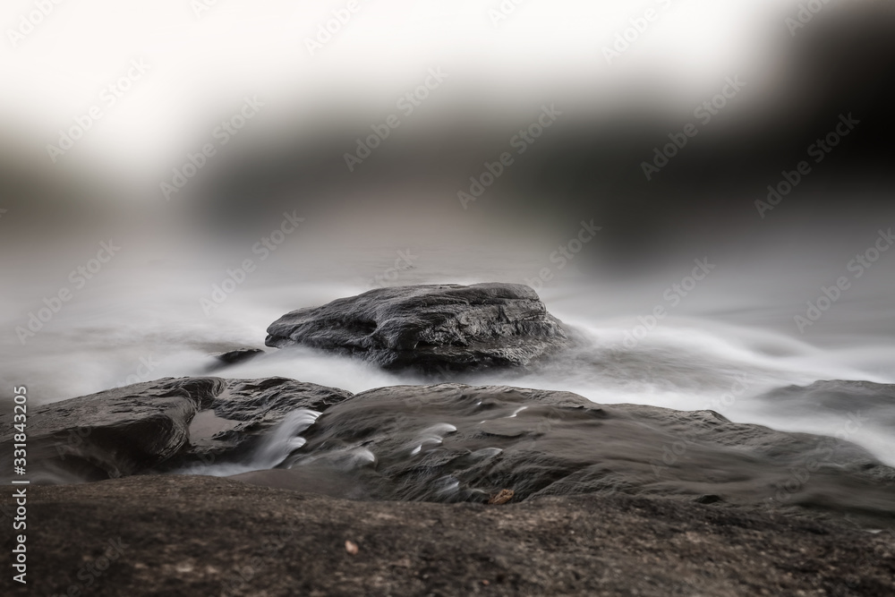 Rock fometion in water with blur background