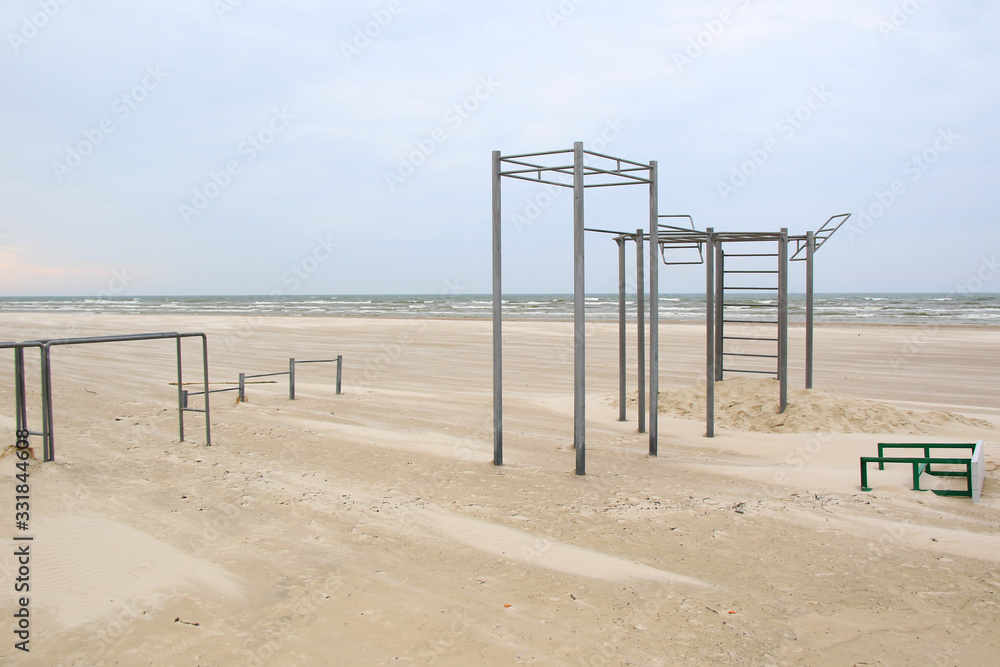 empty public workout ground on the beach empty public workout ground on the beach